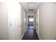 Hallway with wood floors leading to other rooms at 4011 Florida Ave, Atlanta, GA 30360