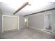 Room with carpeted floors and door at 4011 Florida Ave, Atlanta, GA 30360