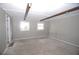 Spacious room with carpeted floors, natural light, and neutral-colored walls at 4011 Florida Ave, Atlanta, GA 30360