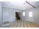 Spacious room with tiled floor and exterior door at 4011 Florida Ave, Atlanta, GA 30360