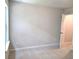 Bright, carpeted bedroom with neutral walls and a window at 684 Sundial Ln, Mableton, GA 30126