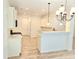 Bright kitchen with granite counters, breakfast bar, and stainless appliances offers a perfect cooking space at 684 Sundial Ln, Mableton, GA 30126