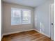 Bright bedroom features hardwood floors and a window that offers natural light at 1810 Oakmont Nw Dr, Atlanta, GA 30314