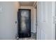 Cozy kitchen featuring a black refrigerator and access to a side door at 1810 Oakmont Nw Dr, Atlanta, GA 30314