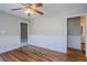 Well-lit living room featuring wood floors, neutral walls, and classic trim at 1810 Oakmont Nw Dr, Atlanta, GA 30314