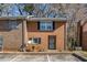 Brick townhome with front parking lot and a well-kept lawn at 4526 Golf Vista Cir, Decatur, GA 30035