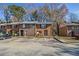 Brick townhome features a traditional design with a front parking lot at 4526 Golf Vista Cir, Decatur, GA 30035
