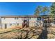 This home has a large backyard and exterior access to the basement at 5498 Balmoral Dr, Douglasville, GA 30135