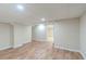 Finished basement area with new floors and walls, perfect for entertaining at 5498 Balmoral Dr, Douglasville, GA 30135