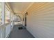 Inviting front porch with ample space for seating, offering a relaxing outdoor experience and pleasant curb appeal at 5498 Balmoral Dr, Douglasville, GA 30135