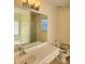Bathroom featuring a large mirror, vanity, and accessible toilet at 682 New England Way, Lawrenceville, GA 30046