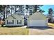 Charming single Gathering home with a well-maintained lawn and two car garage at 682 New England Way, Lawrenceville, GA 30046
