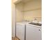 Convenient laundry area with a washer and dryer at 682 New England Way, Lawrenceville, GA 30046