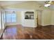 Open-concept living space with view to the kitchen and sunny dining area at 682 New England Way, Lawrenceville, GA 30046