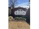 Welcoming Twin Oaks brick sign with flower bed adding curb appeal to the neighborhood at 745 Great Oak Pl, Villa Rica, GA 30180