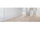 Open hallway with neutral carpet leading to bedrooms and bathrooms at 745 Great Oak Pl, Villa Rica, GA 30180