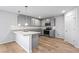 Modern kitchen with stainless steel appliances, granite countertops and hardwood floors at 745 Great Oak Pl, Villa Rica, GA 30180