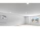 Bright living room featuring recessed lighting and large windows at 745 Great Oak Pl, Villa Rica, GA 30180