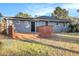 Backyard with a wood deck and a house with light blue siding at 1961 S Columbia, Decatur, GA 30032