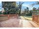 View of wood deck and backyard with lush trees at 1961 S Columbia, Decatur, GA 30032