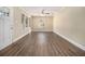 Sunlit living room with hardwood floors, neutral walls and a picturesque view from the large windows at 1961 S Columbia, Decatur, GA 30032
