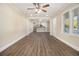Bright living room with hardwood floors, neutral walls and views to the kitchen creating a welcoming space at 1961 S Columbia, Decatur, GA 30032