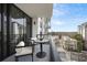 Cozy balcony with outdoor seating and city views, perfect for relaxing and enjoying the urban landscape at 2425 Peachtree Ne Rd # 903, Atlanta, GA 30305