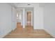 Bright bedroom with hardwood floors leads to the bathroom and kitchen at 2425 Peachtree Ne Rd # 903, Atlanta, GA 30305