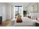 Serene bedroom with a large window offering city views, a cozy bed with plush bedding, and modern decor at 2425 Peachtree Ne Rd # 903, Atlanta, GA 30305