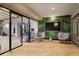 Modern gym with exercise equipment and glass-enclosed workout area at 2425 Peachtree Ne Rd # 903, Atlanta, GA 30305