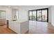 Bright, open kitchen with stainless steel appliances, center island, and large windows at 2425 Peachtree Ne Rd # 903, Atlanta, GA 30305