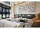 Beautifully decorated lobby with modern lighting fixtures, lounge furniture, and a striking piece of art at 2425 Peachtree Ne Rd # 903, Atlanta, GA 30305