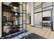 Modern lobby area with decorative shelves and glass-enclosed office at 2425 Peachtree Ne Rd # 903, Atlanta, GA 30305