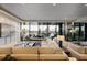 Spacious lounge area with comfortable seating, large windows offering scenic views, and stylish decor at 2425 Peachtree Ne Rd # 903, Atlanta, GA 30305