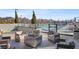 Inviting outdoor lounge area with a fire pit, comfortable seating, and views of the community pool at 2425 Peachtree Ne Rd # 903, Atlanta, GA 30305