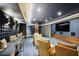 Home theater with plush seating, wall accents, and a large screen at 2425 Peachtree Ne Rd # 903, Atlanta, GA 30305