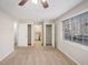 Bedroom featuring carpet, two closets, and a window with natural light at 3699 Narron Sw Dr, Atlanta, GA 30331
