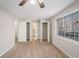Bedroom featuring carpet, two closets, and a window with natural light at 3699 Narron Sw Dr, Atlanta, GA 30331