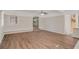 Spacious living room featuring hardwood floors, bright windows, and an open layout at 3699 Narron Sw Dr, Atlanta, GA 30331