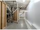 Exposed basement showing unfinished elements, concrete floor, and visible ducts/pipes at 1662 Flintwood Se Dr, Atlanta, GA 30316