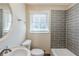 Bathroom with gray tiling, a modern sink, toilet, and shower at 1662 Flintwood Se Dr, Atlanta, GA 30316