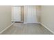 Bedroom with new flooring, a closet, and a door to another room at 1662 Flintwood Se Dr, Atlanta, GA 30316