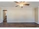 A spacious living room with wood-look flooring and a ceiling fan at 1662 Flintwood Se Dr, Atlanta, GA 30316