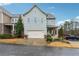 Charming two-story home with a covered porch, two-car garage, and well-maintained landscaping at 33 Hardpan Aly, Marietta, GA 30066