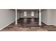Finished basement with durable floors, bright natural light, and columns at 4332 N Hickory Ln, Douglasville, GA 30134
