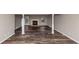 Large basement space featuring a charming fireplace and ample natural light at 4332 N Hickory Ln, Douglasville, GA 30134