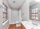 Bathroom with a white shower and modern fixtures at 4332 N Hickory Ln, Douglasville, GA 30134