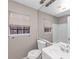 Neutral toned bathroom featuring a shower and a large mirror at 4332 N Hickory Ln, Douglasville, GA 30134