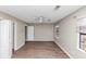 Bedroom with two windows, fan, and two closets at 4332 N Hickory Ln, Douglasville, GA 30134