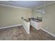 Small bar featuring a sink, cabinetry and mirrored backsplash at 4520 Mossey Dr, Lithonia, GA 30038